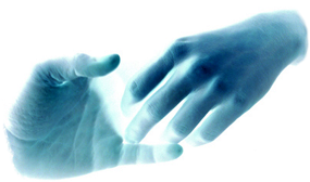 Photograph of hands reaching out