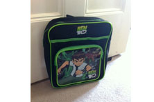 A black and green backpack with an image of Ben 10 on the side