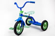 A blue tricycle with green trim and a white seat.