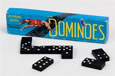 A blue dominoes box with dominoes laid out on a surface.