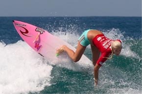 Bethany Hamilton riding her surfboard