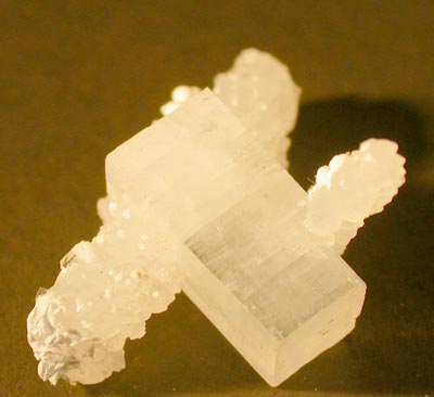 a pale crystal with some long straight edges