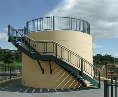 a round platform with stairs winding up the outside