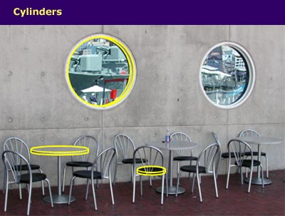 cafe seating near round windows, with cylinder shapes highlighted
