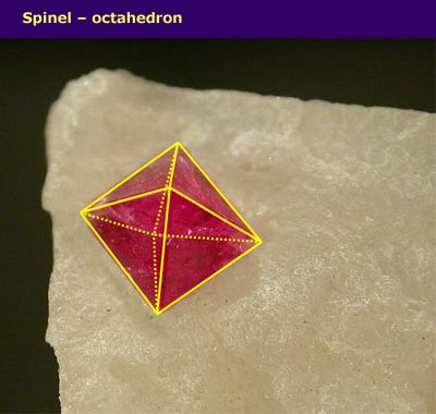 small crystal with straight edges and octahedron shape highlighted