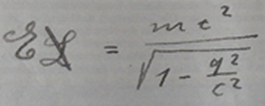 Decorative image of equation E equals MC squared in Einstein's handwriting.