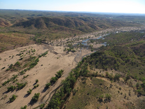 Aerial view of a river and surrounding outback landscape