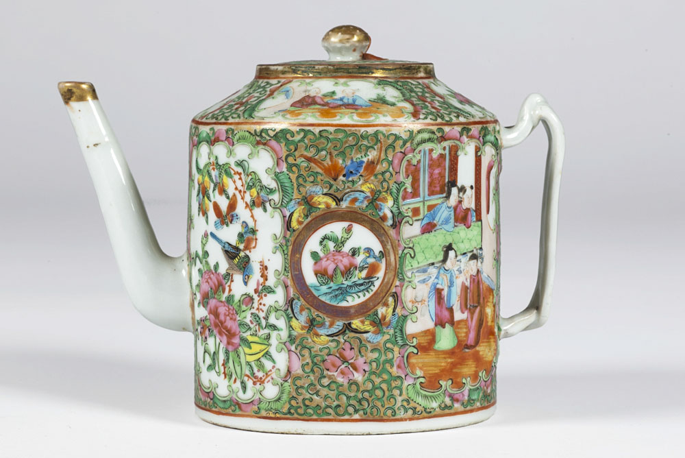 A teapot from a Quong Tart tea room illustrated by garden scenes and for Chinese people on and below a balcony.