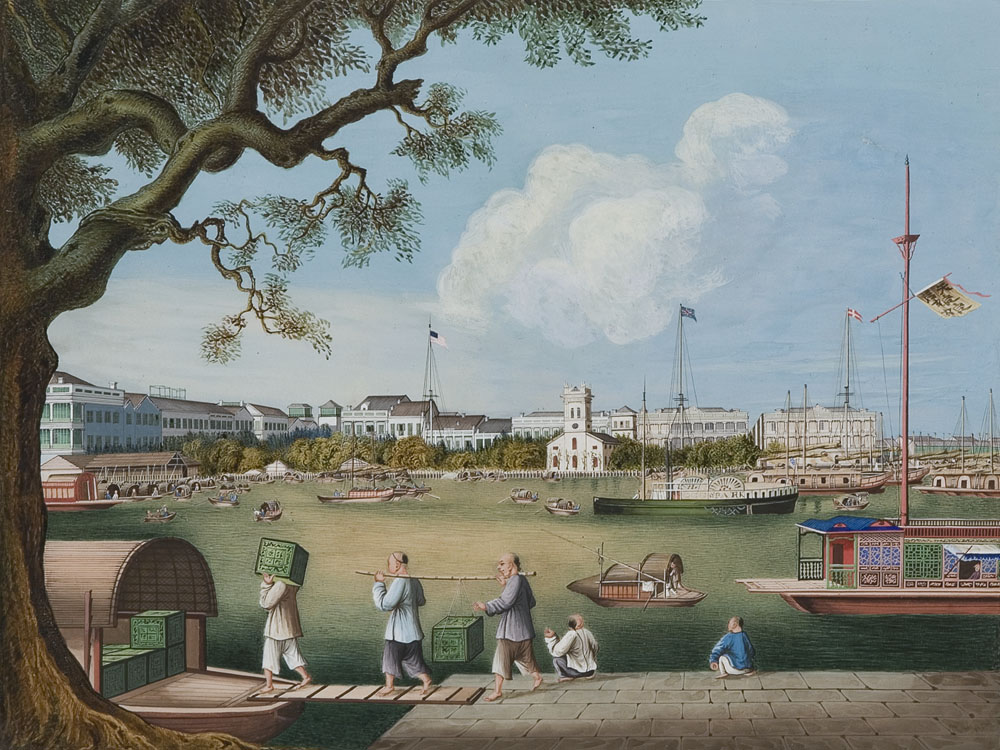 Painting of Canton Harbour. In the foreground, three men load goods onto a small boat while two others sit on te edge of the water front.There are a number of other boats and ships in the harbour. In the background are some of the buildings of Canton.