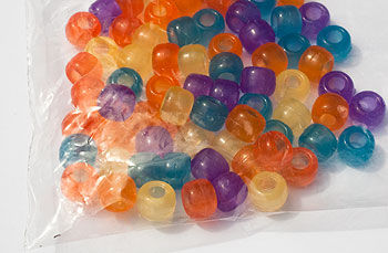 plastic bag with coloured beads