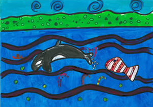 A dolphin and another red and white fish swimming in the ocean near a green shoreline.