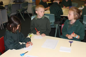 Three students in discussion