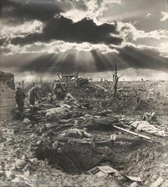 Composite photo of scenes from the Western Front. Photo shows a shell hole in the foreground, Australian troops treating their wounded compatriots surrounded by a war-ravaged field, and a dramatic dark clouded sky with bright breaks of sunshine in the background.