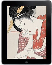 Japanese woman in traditional dress studying a piece of paper in her hands and holding a calligraphy brush